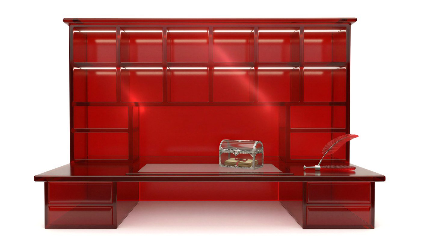 A red glass bureau, letters waiting in its pigeonholes
